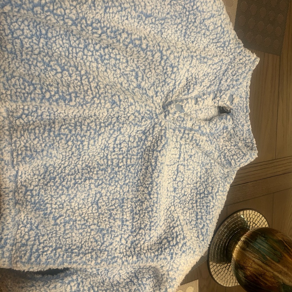 Baby blue Sherpa from PAC Sun, it’s perfect for this season